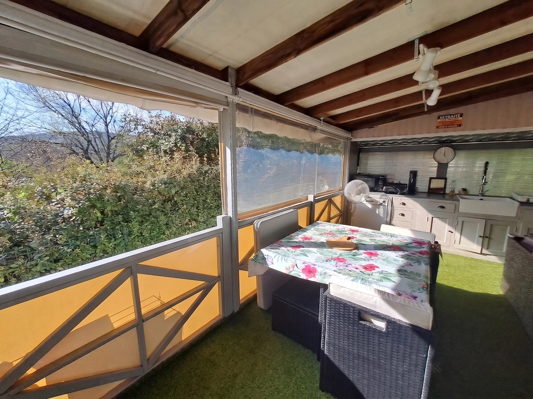 Terrasse fermée et aménagée
